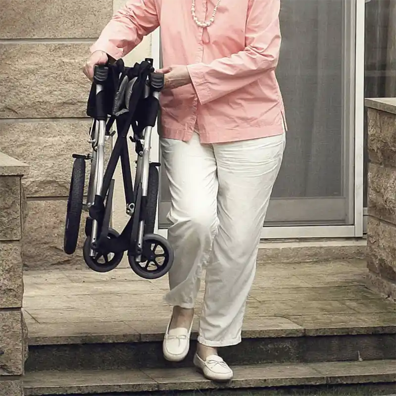Ergo Lite 2 wheelchair transit easy carry by woman