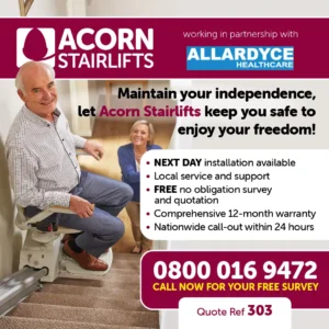 Acorn stairlift with elderly man on stairlift and woman looking up at him.